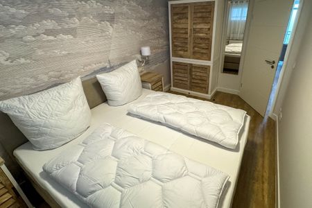 Apartmenthaus Atlantik Apartmenthaus Atlantik 311 Kühlungsborn - Schlafzimmer mit Doppelbett