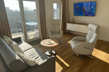 NordseeResort Friesland Nordseeresort Friesland 50-3-m Schillig - Wohn-Essbereich mit Flatscreen-TV