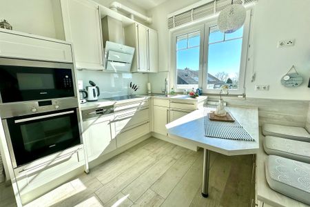 2001 - Penthouse Brigitte mit Teilmeerblick und Hund Kellenhusen -