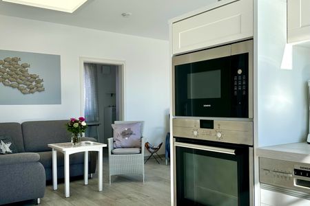 2001 - Penthouse Brigitte mit Teilmeerblick und Hund Kellenhusen -