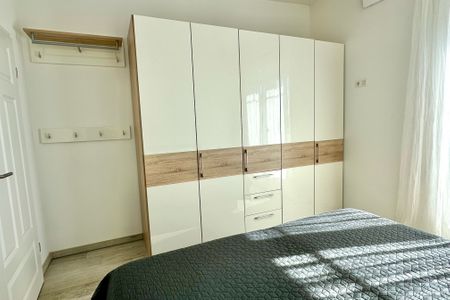 2001 - Penthouse Brigitte mit Teilmeerblick und Hund Kellenhusen -