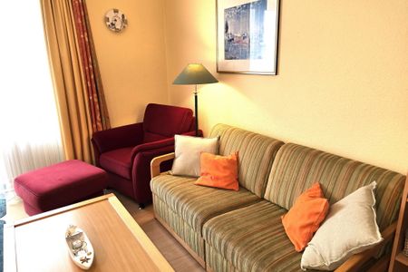Hus Inselkieker Hus Inselkieker 216 Schillig - Wohn-/Essbereich mit Couch