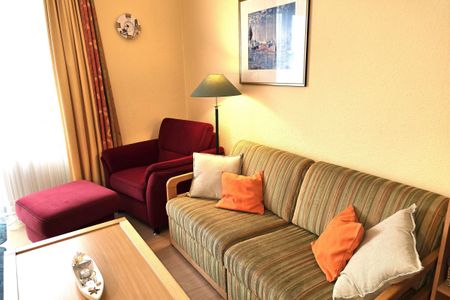 Hus Inselkieker Hus Inselkieker 216 Schillig - Wohn-Essbereich mit Couch