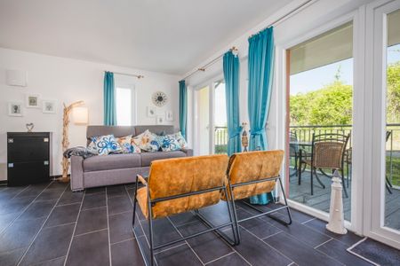 NordseeResort Friesland NordseeResort Friesland 51-0-N Schillig - Wohn-Essbereich mit Couch