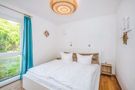 NordseeResort Friesland NordseeResort Friesland 51-0-N Schillig - Schlafzimmer mit Doppelbett