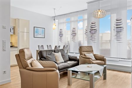 DünenResort Binz DünenResort Binz 435 Rügen - Wohn-Essbereich mit Couch