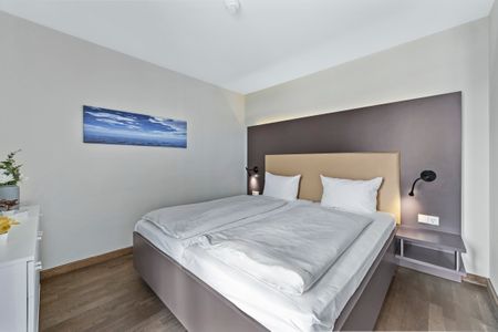 Resort Deichgraf Resort Deichgraf 27-13 Wremen - Schlafzimmer mit Doppelbett