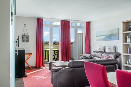 Resort Deichgraf Resort Deichgraf 27-21 Wremen - Wohnzimmer mit Ausblick