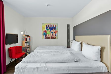 Resort Deichgraf Resort Deichgraf 31-07 Wremen - Schlafzimmer mit Doppelbett und TV