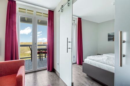 Resort Deichgraf Resort Deichgraf 31-13 Wremen - Schlafzimmer mit Ausblick
