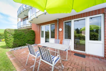 Hus Inselkieker Hus Inselkieker 002 Schillig - Terrasse mit Gartenmöbel