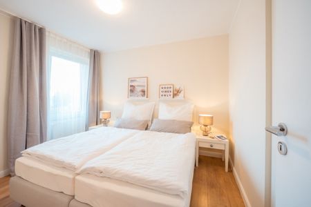 Hus Inselkieker Hus Inselkieker 110 Schillig - Schlafzimmer mit Doppelbett und Kleiderschrank