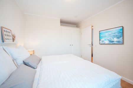 Hus Inselkieker Hus Inselkieker 110 Schillig - Schlafzimmer mit Kleiderschrank