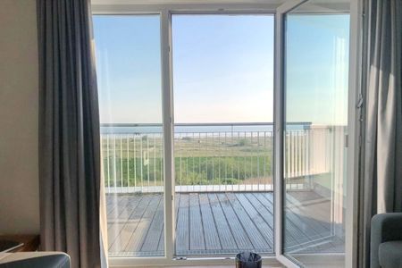 NordseeResort Friesland Ferienhäuser NordseeResort Friesland 48-6-n Schillig - Blick auf den Balkon