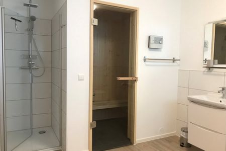 NordseeResort Friesland Ferienhäuser NordseeResort Friesland 48-6-n Schillig - Badezimmer mit Saunabereich