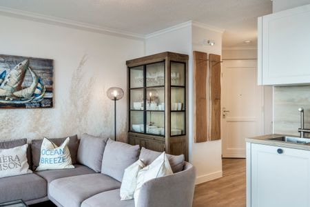 Apartmenthaus Atlantik Apartmenthaus Atlantik 311 Kühlungsborn - Wohn-Essbereich mit Couch
