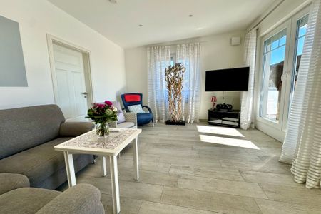 2001 - Penthouse Brigitte mit Teilmeerblick und Hund Kellenhusen -