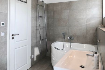 NordseeResort Friesland Ferienhäuser NordseeResort Friesland 1 Schillig - Badezimmer mit Badewanne