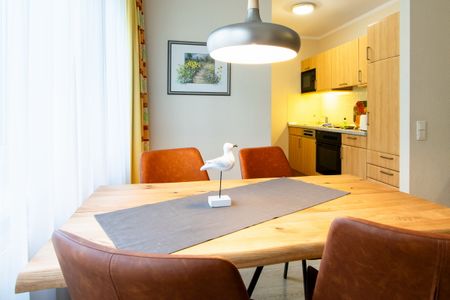 Inselstrand Inselstrand 216 Usedom - Wohn-Essbereich mit Esstisch und Sitzgelegenheit