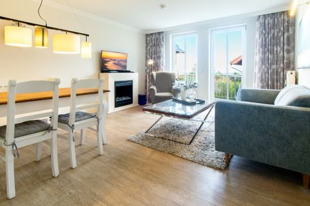 Seehof Seehof 224 Usedom - Wohn-Essbereich mit Couch und Esstisch
