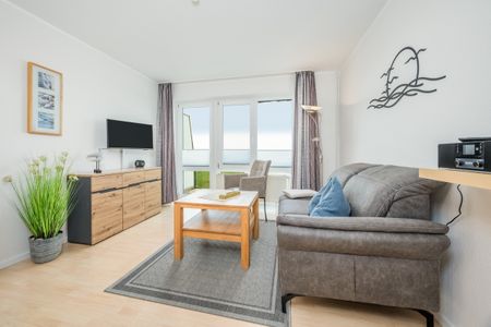 Hus Strandkieker Hus Strandkieker 09 Schillig - Wohn-Essbereich mit Flatscreen-TV