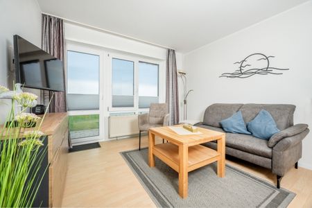 Hus Strandkieker Hus Strandkieker 09 Schillig - Wohn-Essbereich mit Couch