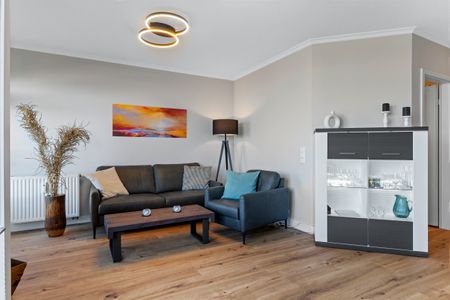 Apartmenthaus Atlantik Apartmenthaus Atlantik 312 Kühlungsborn - Wohn-Essbereich mit Couch und Sessel