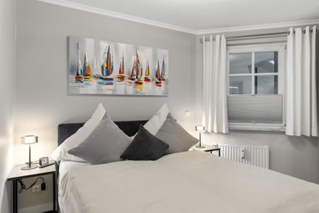 Apartmenthaus Atlantik Apartmenthaus Atlantik 312 Kühlungsborn - Erstes Schlafzimmer mit Doppelbett