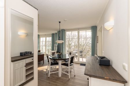 Apartmenthaus Atlantik Apartmenthaus Atlantik 314 Kühlungsborn - Wohn-Essbereich mit Esstisch und Sitzgelegenheit