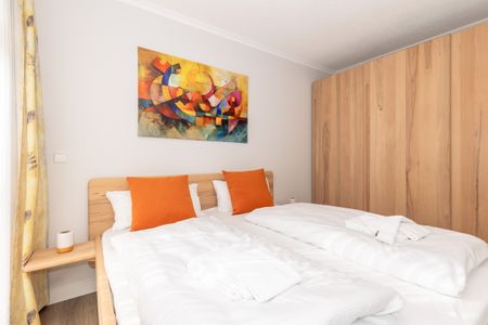 Apartmenthaus Atlantik Apartmenthaus Atlantik 314 Kühlungsborn - Schlafzimmer mit Doppelbett