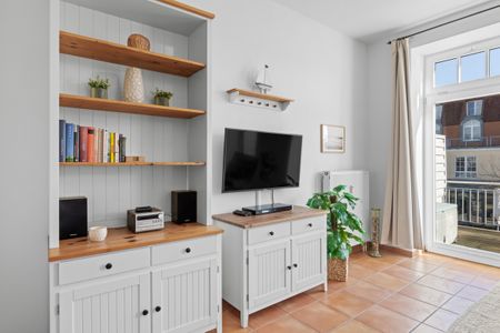 Strandstraße 32 Strandstraße 32-19 Kühlungsborn - Wohn-Essbereich mit Flatscreen-TV