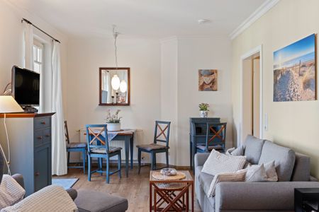 Ulmenschlösschen Ulmenschlösschen 08 Kühlungsborn - Wohn-Essbereich mit Couch