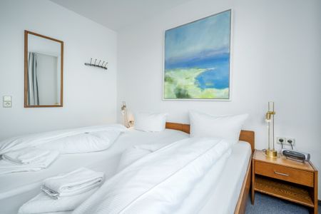 Hus Strandkieker Hus Strandkieker 08 Schillig - Schlafzimmer mit Doppelbett