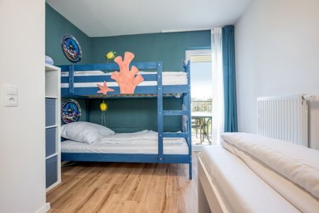 NordseeResort Friesland NordseeResort Friesland 51-0-M Schillig - Schlafzimmer mit Etagenbett und Einzelbett