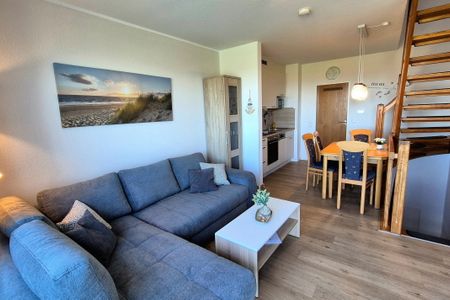 Hus Strandkieker Hus Strandkieker 03 Schillig - Wohn-Essbereich mit Esstisch