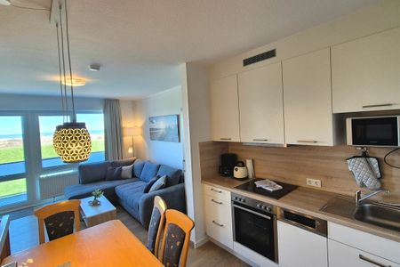 Hus Strandkieker Hus Strandkieker 03 Schillig - Wohn-Essbereich mit Essbereich und Küchenzeile