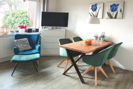 Urlauberdorf Urlauberdorf 33b Boltenhagen - Wohn-Essbereich mit Esstisch und Sitzgelegenheit
