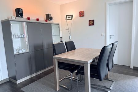 Resort Deichgraf Resort Deichgraf 31-04 Wremen - Wohn-Essbereich mit Esstisch und Sitzgelegenheit