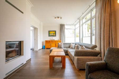 Ostseeland Ostseeland Lotsenstieg 11 Usedom - Wohnzimmer mit Kamim im Lotsenstieg 11 in Karlshagen auf Usedom