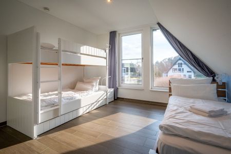 Ostseeland Ostseeland Lotsenstieg 11 Usedom - Schlafzimmer mit Etagenbett im Lotsenstieg 11 in Karlshagen