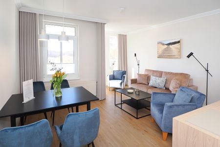 Seehof Seehof 201 Usedom - Wohn-Essbereich der Ferienwohnung Seehof201 auf Usedom mit Couch und Esstisch