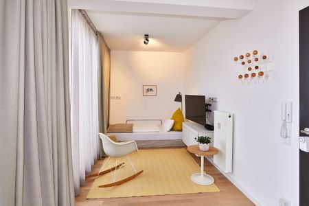 Lüttjeod Apartmentvilla Lüttjeod Apartmentvilla 18 Langeoog - Wohn-Essbereich mit Couch im lalo18, Hauptstraße 9, Lüttjeod Apartmentvilla 18 auf Langeoog