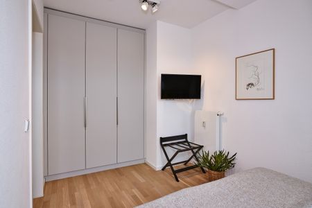 Lüttjeod Apartmentvilla Lüttjeod Apartmentvilla 18 Langeoog - Schlafzimmer mit Kleiderschrank im lalo18, Hauptstraße 9, Lüttjeod Apartmentvilla 18 auf Langeoog