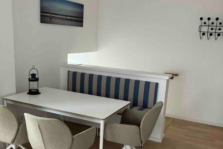 Lüttjeod Apartmentvilla Lüttjeod Apartmentvilla 09 Langeoog - Wohn-Essbereich mit Sitzecke im lalo09, Hauptstraße 9, Lüttjeod Apartmentvilla 09 auf Langeoog
