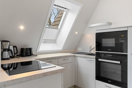 Villa Löwenstein Villa Löwenstein 14 Kühlungsborn - Küchenzeile mit Backofen im kbvl14, Villa Löwenstein, Ostseeallee 27 auf Langeoog