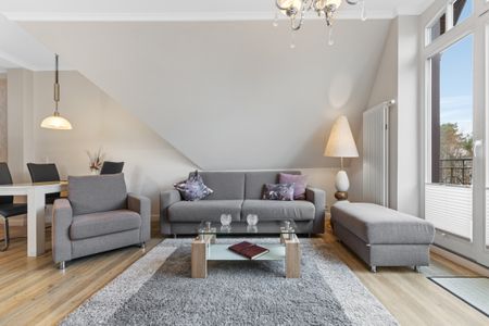 Villa Löwenstein Villa Löwenstein 14 Kühlungsborn - Wohnzimmer mit Couch im kbvl14, Villa Löwenstein, Ostseeallee 27 auf Langeoog