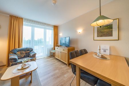 Hus Inselkieker Hus Inselkieker 217 Schillig - Wohn-Essbereich mit Flatscreen-TV im sihi217, Hus Inselkieker, Mellumweg 6b in Schillig