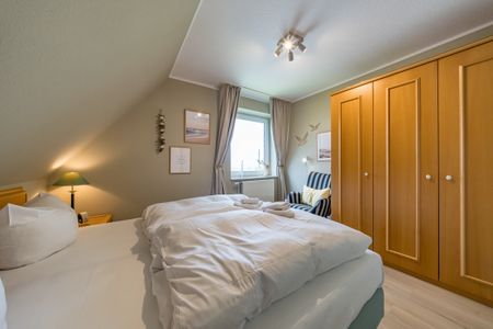 Hus Inselkieker Hus Inselkieker 217 Schillig - Erstes Schlafzimmer mit Kleiderschrank im sihi217, Hus Inselkieker, Mellumweg 6b in Schillig