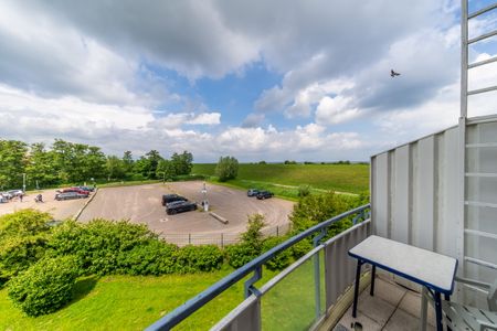 Hus Inselkieker Hus Inselkieker 217 Schillig - Balkon mit Gartenmöbeln im sihi217, Hus Inselkieker, Mellumweg 6b in Schillig