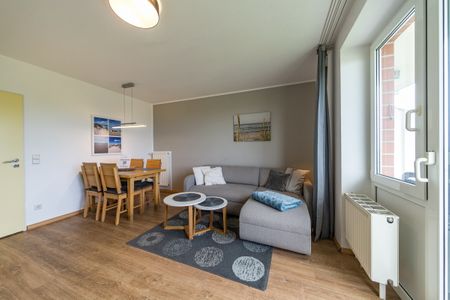 Hus Inselkieker Hus Inselkieker 220 Schillig - Wohn-Essbereich mit Esstisch im sihi220, Hus Inselkieker, Mellumweg 6b in Schillig
